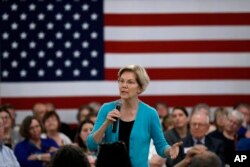 FILE - Democratic presidential candidate Sen. Elizabeth Warren speaks to local residents, May 26, 2019, in Ottumwa, Iowa.