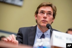 FILE - Virginia Tech environmental engineering professor Marc Edwards testifies on Capitol Hill in Washington, March 15, 2016.