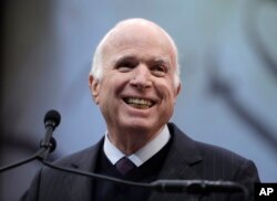 FILE - Sen. John McCain, R-Ariz., receives the Liberty Medal from the National Constitution Center in Philadelphia, Monday, Oct. 16, 2017.