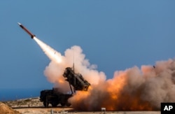 FILE - Patriot weapons system being fired at the NATO Missile Firing Installation in Chania, Greece. Online videos are raising new questions about Saudi Arabia's claims that it has intercepted nearly every ballistic missile launched by Shi'ite rebels in Y