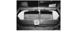 The windshield that was removed from the presidential limousine that carried President John F. Kennedy during the assassination on Nov. 22, 1963, is one of the artifacts held by the National Archives.