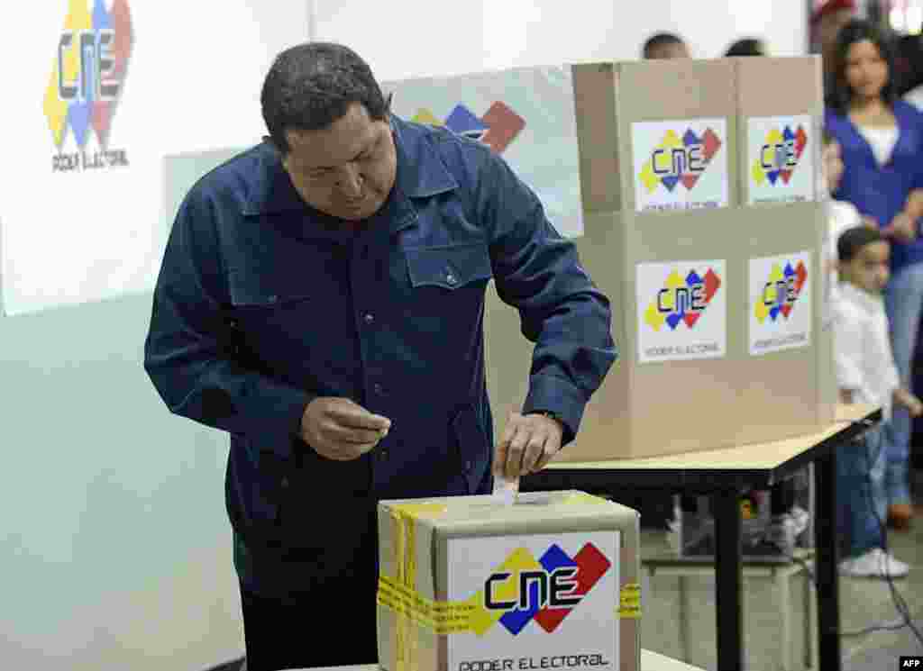 Venezuelan President Hugo Chavez casts his vote in Caraca during presidential elections.