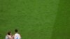 Wachezaji Luka Modric wa Croatia na Ivan Perisic wakishangilia baada ya mechi ambapo walimaliza katika nafasi ya tatu katika uwanja wa Kimataifa wa Khalifa, Doha, Qatar Desemba 17, 2022.REUTERS