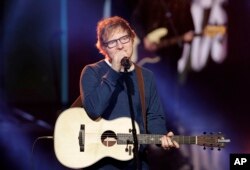 British singer Ed Sheeran performs during the Italian State RAI-TV program "Che Tempo che Fa," in Milan, Italy, March 12, 2017.