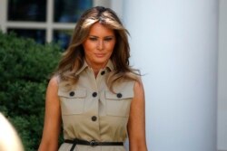 First Lady Melania Trump walks after speaking during a White House National Day of Prayer Service in the Rose Garden of the White House, Thursday, May 7, 2020, in Washington. (AP Photo/Alex Brandon)