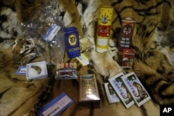 FILE - Illegally trafficked animal products are displayed in a warehouse at the National Wildlife Property Repository in Commerce City, Colo., Oct. 20, 2015.