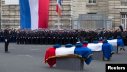 Parijdagi xurujda halok bo'lgan politsiyachilarning dafn marosimi, 13-yanvar, 2015-yil