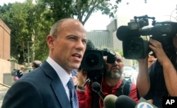 FILE - Adult actress Stormy Daniels' lawyer Michael Avenatti talks to the media outside of Los Angeles County Superior Court after a hearing in Los Angeles, July 10, 2018.