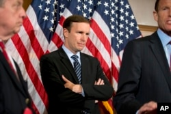 FILE - Sen. Chris Murphy, D-Conn., stands during a media availability on Capitol Hill in Washington, June 20, 2016.