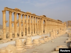 The demolition of ancient monuments like this colonnade in the historical city of Palmyra, Syria was targeted by the Islamic State group and among cultural sites destroyed in 2015.