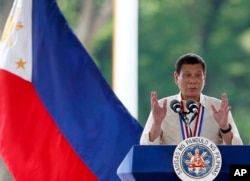 FILE - Philippine President Rodrigo Duterte speaks in suburban Taguig city, east of Manila, Aug. 29, 2016.