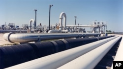 An undated photo provided by the U.S. Energy Department shows crude oil pipelines near Freeport, Texas.