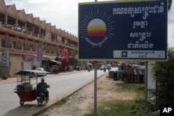 A signboard logo of the opposition Cambodia Rescue Party sticks on a sidewalk at the outskirts of Phnom Penh, Cambodia, Oct. 6, 2017. Cambodia's government has taken the initial legal steps to dissolve the country's major opposition party.