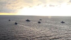 Potongan gambar dari video yang yang dirilis oleh Kementerian Pertahanan Rusia ini menunjukkan Kapal Angkatan Laut Rusia berpartisipasi dalam latihan di dekat wilayah Crimea di Laut Hitam, pada 22 April 2021. (Foto: AP)