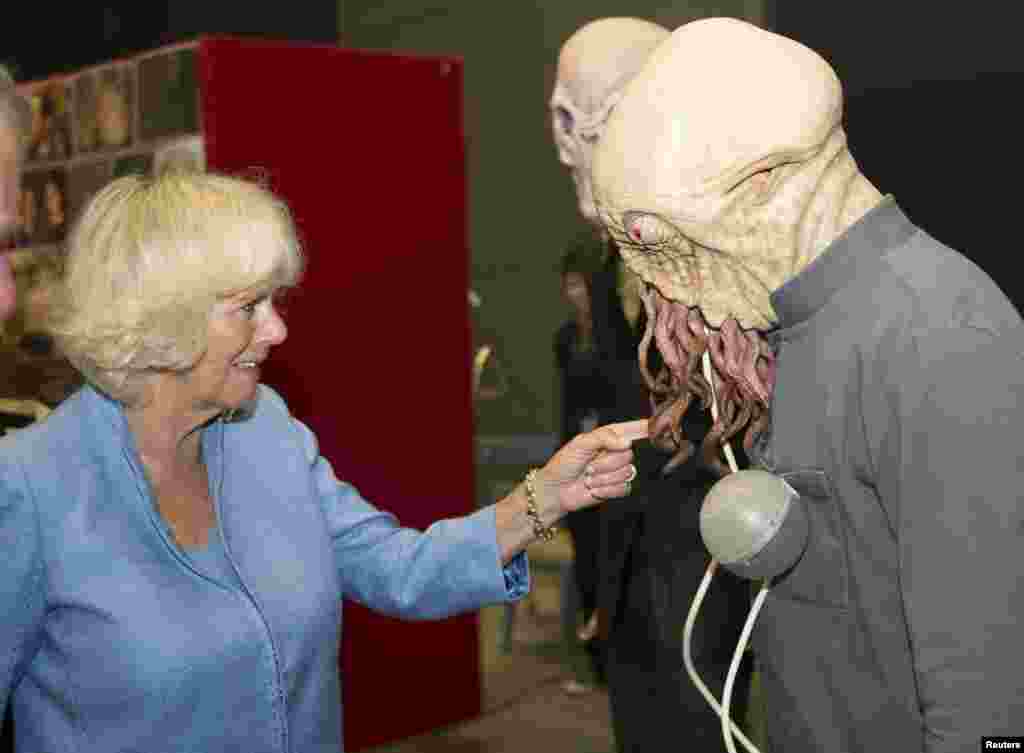 Britain&#39;s Camilla, Duchess of Cornwall, meets with an Ood during her visit to the set of the BBC One drama series Doctor Who, at Roath Lock Studios in Cardiff.