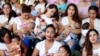 FILE - Mothers nurse their children to mark the World Breastfeeding Week to promote global support for breastfeeding in Ciudad Juarez, Mexico, Aug. 4, 2018.