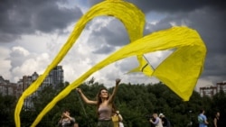 A participant flies a kite during the 'Letatlin N4' annual Festival of Kites, in Moscow, Russia, June 6, 2021.