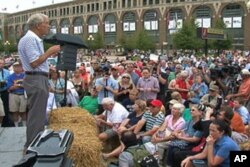 Texas Congressman and presidential candidate Ron Paul speaks to a crowd at the Iowa State Fair, in the state capital Des Moines, August 12, 2011