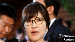 Japan's new defense minister Tomomi Inada talks to reporters at Prime Minister Shinzo Abe's official residence in Tokyo, August 3, 2016.