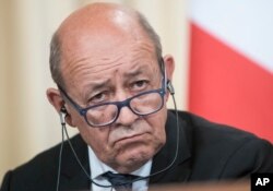 FILE - France's Foreign Minister Jean-Yves Le Drian is pictured at a news conference in Moscow, Sept. 8, 2017.