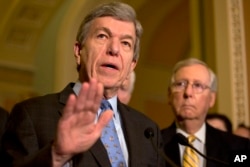 FILE - Sen. Roy Blunt, R-Mo., left, accompanied by Senate Majority Leader Mitch McConnell of Ky., speaks about Zika funding during a news conference on Capitol Hill in Washington, May 17, 2016.