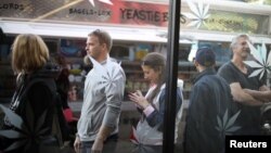 Customers line up for recreational marijuana outside the MedMen store in West Hollywood, California, Jan. 2, 2018.