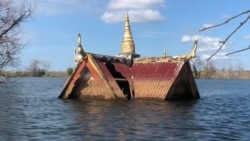 រូបឯកសារ៖ វត្ត​អារាម​មួយលិចលង់​នៅ​សល់​តែ​ដំបូល​ដោយសារ​តែ​រងឥទ្ធិពល​ពី​ទំនប់​វារី​អគ្គិសនី​សេសាន​ក្រោម​២ ​ក្នុងស្រុក​ស្រែគរ ខេត្ត​ស្ទឹងត្រែង ថ្ងៃទី២៨ ខែវិច្ឆិកា ឆ្នាំ២០១៨។ (ស៊ុន ណារិន/វីអូអេ)