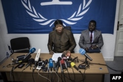The International Criminal Court's (ICC) chief prosecutor, Fatou Bensouda (C), holds a press conference during her visit to look into allegations of extreme violence on May 3, 2018 in Kinshasa, Democratic Republic of Congo..