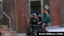 Street musician in Manhattan Chinatown, New York City (October 2013)