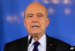Former French prime minister Alain Juppe delivers a speech in Bordeaux, France, March 6, 2017.