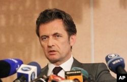 President of the Assembly of State Parties to the Rome Statute of the International Criminal court, Christian Wenaweser, speaks to journalists in Nairobi, Kenya, Jan. 28, 2011.