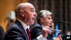 FILE - Secretary of Homeland Security Alejandro Mayorkas testifies before a Senate Homeland Security and Governmental Affairs Committee hearing, on Sept. 21, 2021 on Capitol Hill.