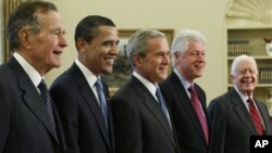 Members of the exclusive Presidents Club (from left) George H.W. Bush, Barack Obama, George W. Bush, Bill Clinton and Jimmy Carter, Wednesday, Jan. 7, 2009, in the Oval Office
