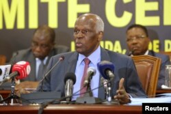 FILE - Angolan President and MPLA leader, Jose Eduardo dos Santos attends a party central committee at a meeting in Luanda, Angola, Dec. 2, 2016.