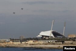 FILE - Russian warplanes fly over the Mediterranean coastal city of Latakia, Syria, Jan. 28, 2016.