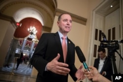 Rep. Adam Schiff, D-Calif., ranking member of the House Intelligence Committee, takes questions from reporters at the Capitol in Washington, May 10, 2018.