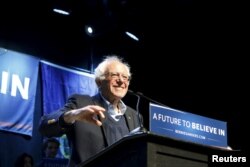 FILE -- U.S. Democratic presidential candidate and U.S. Senator Bernie Sanders smiles as he waves to supporters at a campaign rally in Portland, Maine, on March 2, 2016.