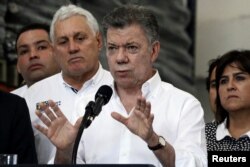 Colombia's President Juan Manuel Santos talks to reporters after a meeting with regional authorities in Cucuta, Colombia, Feb. 8, 2018.