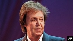 Paul McCartney during 26 Oct concert performance