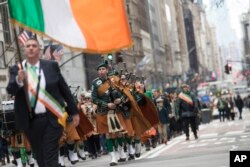 Bagpipers march up Fifth Avenue during the St. Patrick's Day Parade, March 16, 2019, in New York.