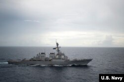 FILE - Guided-missile destroyer USS Decatur (DDG 73) operates in the South China Sea as part of the Bonhomme Richard Expeditionary Strike Group (ESG).
