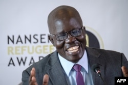 South Sudanese surgeon Evan Atar Adaha speaks during a press conference in the Kenyan capital Nairobi, Sept. 25, 2018, after being presented the UNHCR’s 2018 Nansen Refugee Award.