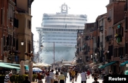 FILE - The MSC Divina cruise ship is seen in Venice lagoon, June 16, 2012.