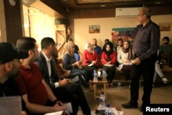 Students of journalism gather at training workshop for Iraqi journalists at Qantara Culture Cafe in Mosul, Oct. 26, 2018.
