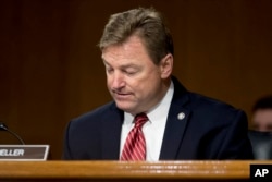 FILE - Sen. Dean Heller, a Nevada Republican, is pictured in Washington on Capitol Hill, Feb. 14, 2017.