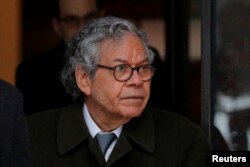 FILE - John Kapoor, the billionaire founder of Insys Therapeutics Inc., leaves the federal courthouse in Boston, March 13, 2019.