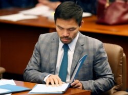 Senator Filipina dan juara tinju Manny Pacquiao saat mengikuti sidag Senat di kota Pasay, Metro Manila, Filipina 20 September 2016. (REUTERS)