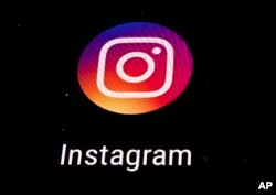 FILE - The Instagram icon is displayed on a mobile screen in Los Angeles.