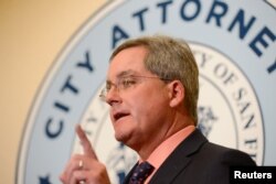 San Francisco City Attorney Dennis Herrera announces he has filed a lawsuit against President Donald Trump for his executive order targeting sanctuary cities, Jan. 31, 2017.