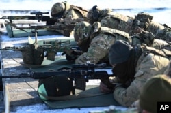 Ruski vojnici sudjeluju u vježbama na poligonu Kadamovskiy u regiji Rostov na jugu Rusije, četvrtak, 13. januara 2022.